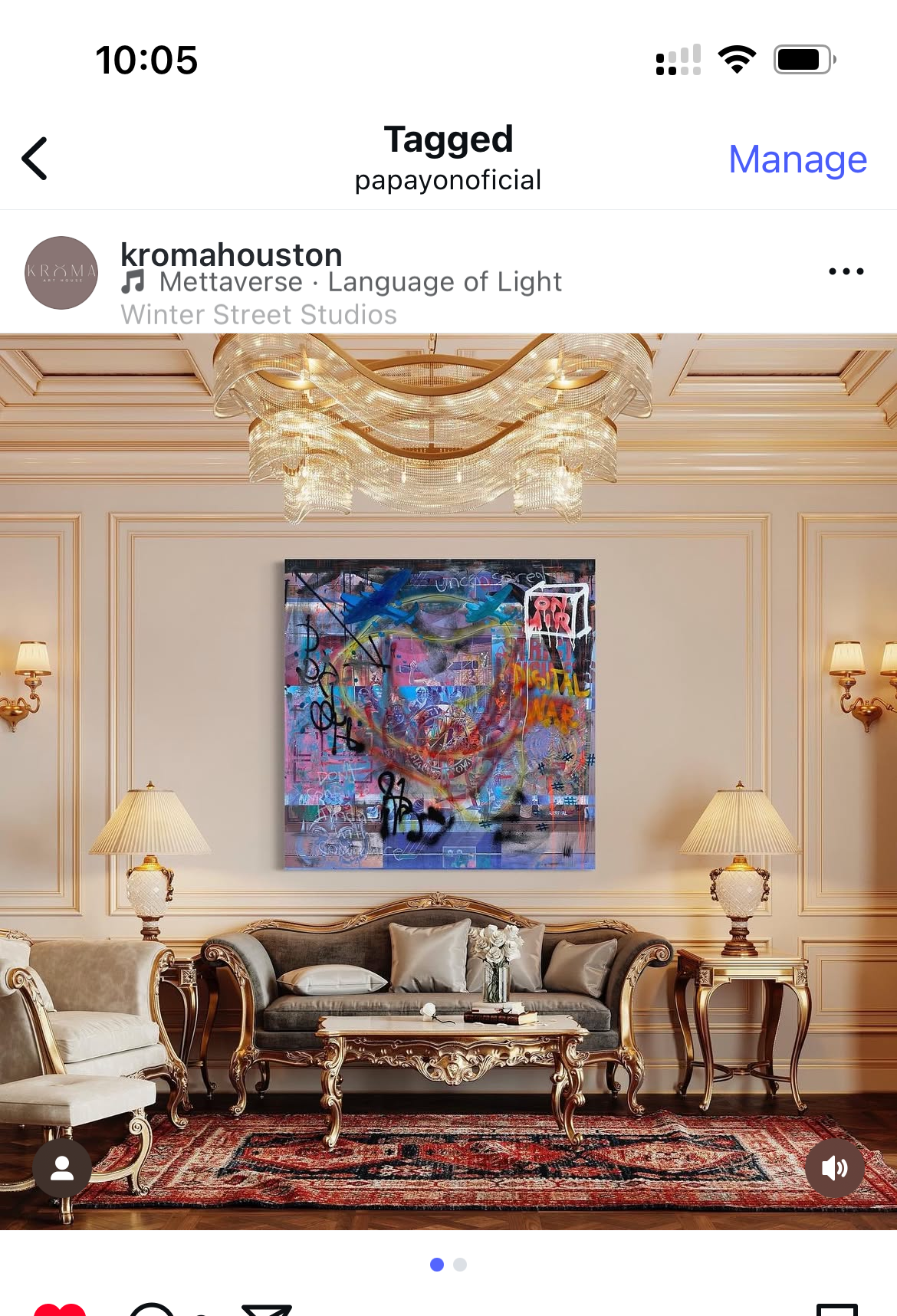 Luxurious living room with a colorful abstract painting on the wall.